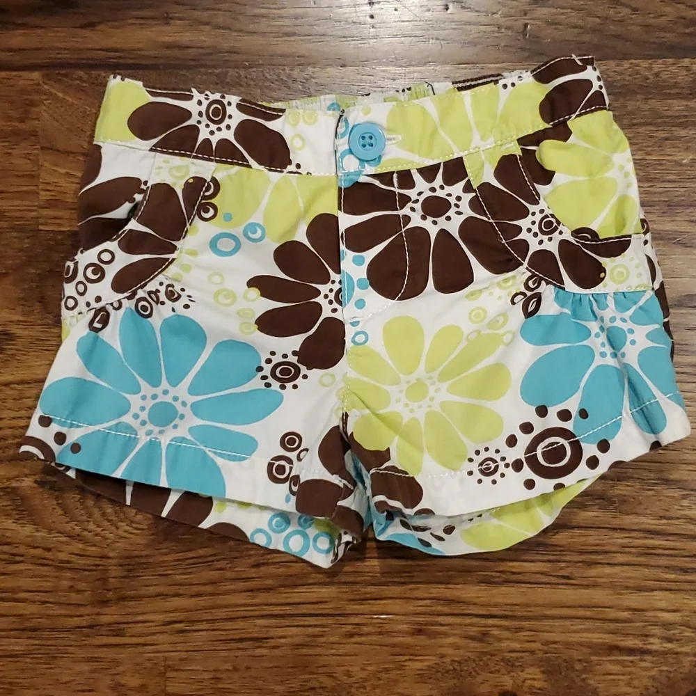 Girls Carter's brown, lime, & blue floral shorts size 24M